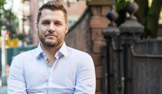 A headshot of best-selling author Mark Manson